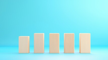 Poster - A minimalist arrangement of wooden blocks on a light blue background, depicting varying heights and a clean, modern aesthetic.