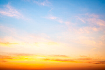 Wall Mural - beautiful , luxury soft gradient orange gold clouds and sunlight on the blue sky perfect for the bac