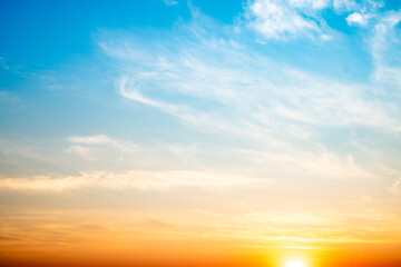 Wall Mural - beautiful , luxury soft gradient orange gold clouds and sunlight on the blue sky perfect for the bac