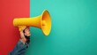 © EchoFrame - Vibrant Yellow Megaphone Held Against a Split Red and Teal Backdrop Capturing a Bold Statement and Dynamic Communication in a Minimalist Style