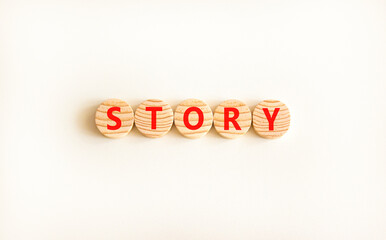 Fototapete - Story symbol. Concept word Story on beautiful wooden circles. Beautiful white table white background. Business lifestyle story concept. Copy space.
