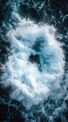 Poster - Aerial view of ocean wave creating a dramatic splash of white foam in deep blue water sea vortex