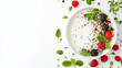 © Yana Zolotova - Smoothie bowl with berries chia and mint on white background