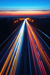 Poster - Dynamic Highway at Twilight with Blurred Car Light Trails Under a Vibrant Sky and Distant City Lights Creating a Sense of Motion and Connection