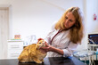 © ShapikMedia - Brno, Czech Republic - March 28, 2025: A veterinarian examines a cat during an appointment at a veterinary clinic