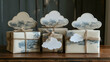 © annafik - Gifts wrapped in cream-colored paper with a blue landscape design tied with twine and topped with cloud decorations on