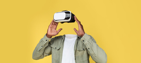 Poster - A person interacts with virtual reality equipment, showcasing advanced technology.