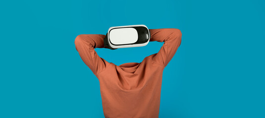 Poster - This modern user interacts with advanced virtual reality technology, focusing on immersive experiences. The vibrant background emphasizes the gadget's sleek design and its transformative potential.