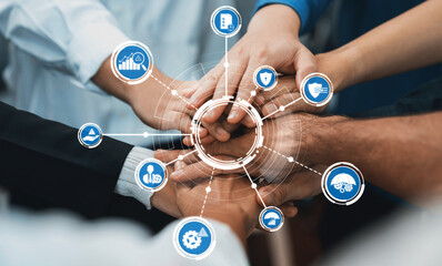 Poster - group of diverse office worker join hand together in office room symbolize business synergy and stro