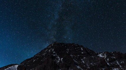 Wall Mural - beautiful night sky time lapse with milky way galaxy over the mountains. night tight landscape starr