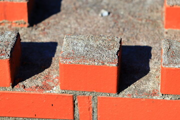 Aufkleber - A detailed shot of a red brick wall with texture and color prominent.