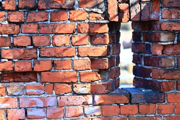 Poster - A brick wall with a hole in it.