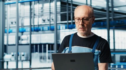 Poster - industry 4.0 industrial plant senior engineer automating robotic machines using laptop software. exp