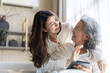 © Art_Photo - Portrait of enjoy happy love asian family senior mature mother and young daughter smiling play laughing and having fun together at home, care, elderly, insurance.happy family and Mother Day concept