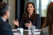 © MastersedZ - confident businesswoman leading meeting in modern office setting