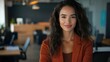 © I Have Photos - Confident Woman in Office Environment with Warm Brown Tones