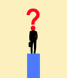 © Westend61 - Silhouette of a businessman with a question mark head standing on a platform