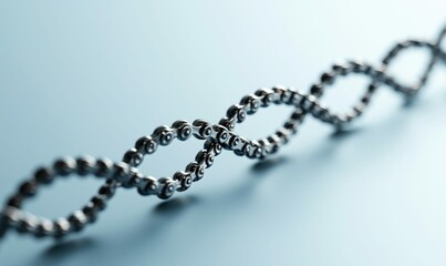 Poster - A shiny bicycle chain is arranged in a looping pattern on a graduated blue background.