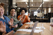 © ReeldealHD images - Team Applauding During Engaging Meeting Session