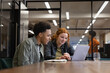 © ReeldealHD images - Happy Colleagues Working Together on Laptop