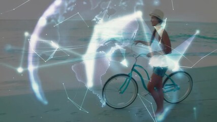 Poster - Woman walking bicycle on beach with digital world map overlay animation