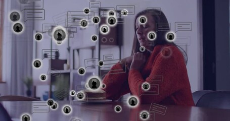 Poster - At table, woman in red sweater with animation of social media icons overlaying