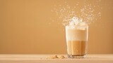 Wet Iced latte with droplets forming on the glass as steam rises from it.