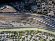 © ADDICTIVE STOCK - Aerial view of Brig Switzerland railway station and surroundings