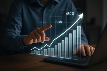 Poster - Ascending Business Chart: A businessman points toward a rising financial chart displayed on a laptop screen, representing growth and success in the business.