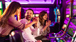 © Dragana Gordic - Friends Celebrating a Win at the Casino Slot Machines Vibrant Setting