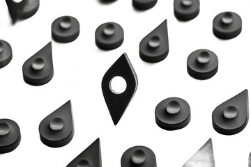 Poster - A monochrome arrangement of abstract shapes with circular and teardrop elements on a black background