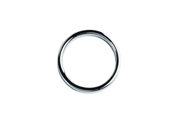 Poster - A gleaming silver ring isolated against a stark black background in a minimalist composition style