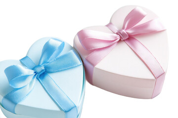 Poster - Two heart shaped gift boxes one blue and the other pink with ribbons on a transparent background