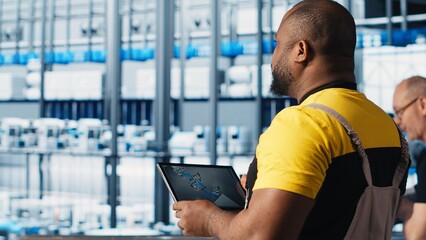 Poster - photovoltaic smart factory engineer uses tablet to design production lines for assembly facility in 