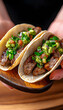 © Supriyono - Two delicious steak tacos with vibrant salsa verde . AI generative