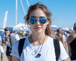 © Supriyono - Young woman in sunglasses at outdoor event