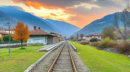Aufkleber - Scenic train tracks at sunset in a mountain valley.