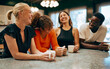© Flamingo Images - Happy Group Of Diverse Friends Laughing Together Over Coffee At Cafe