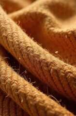 Poster - Soft golden fibers curl and twist together capturing the warmth of a cozy atmosphere. The texture invites touch suggesting comfort and the beauty of handcrafted textiles.