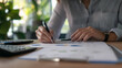 © plaksa - Real Estate concept, Agent to present the property .price for loan investment chart graph documents and calculating table payment to customer.