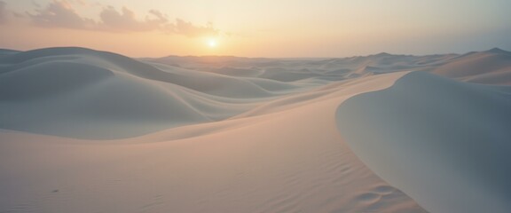 Poster - Sand dunes stretch to the horizon, sun low in the sky, soft light bathing the desert landscape with warm hues.