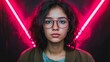 © Radomir Jovanovic - Young woman with curly hair and glasses poses against vivid pink neon lights in a creative studio environment