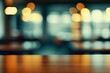 © Ibnu - Blurred cafe interior, warm wooden table