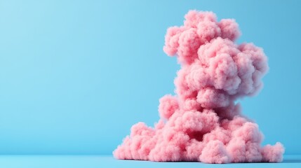 Poster - Fluffy light pink cloud-like shape on pale blue background resembling cotton candy or a stylized smoke plume evoking softness and whimsy in design