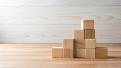 Poster - Wooden blocks arranged in ascending order on a table against a wood background