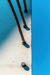 Poster - Minimalist Industrial Design Geometric Rope Anchor Points on Crisp Blue-White Texture - Modern Architectural Precision and Structural Aesthetic Innovation