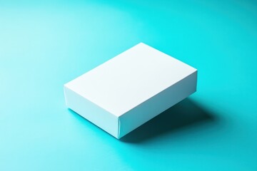 Fototapete - Minimalist white box on a vibrant turquoise background showcasing packaging design elements
