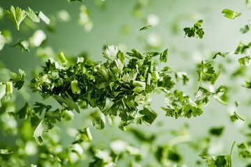 Poster - Freshly chopped parsley floating in the air creates an artistic view against a blurred green background
