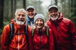 © NikoG - Portrait of smiling group of senior hikers while raining in forest