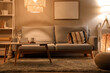 © Pixel-Shot - Interior of modern living room with grey sofa, coffee table and glowing lamps at evening